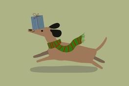 ein Hund bringt freudig ein Geschenk