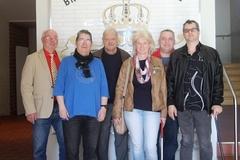 Behindertenbeirat Gruppenfoto des Behindertenbeirates vor dem Stadtwappen im Rathaus